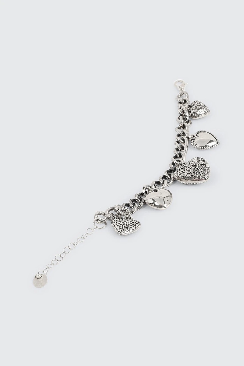 Bracelet volumineux à breloques cœurs