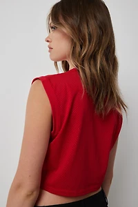 Haut sport ultracourt en maille filet