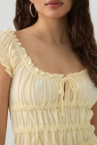 Haut court à volants