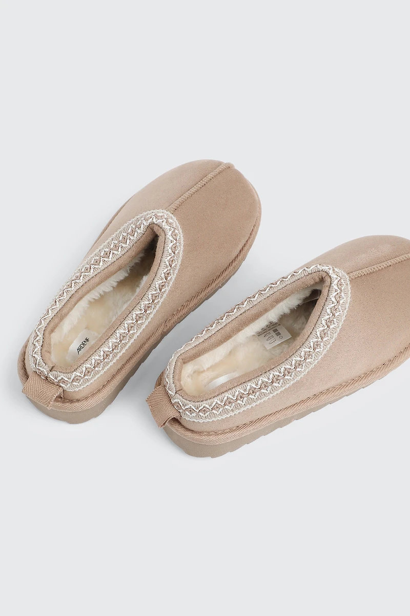 Sabots en faux mouton à bordure accent