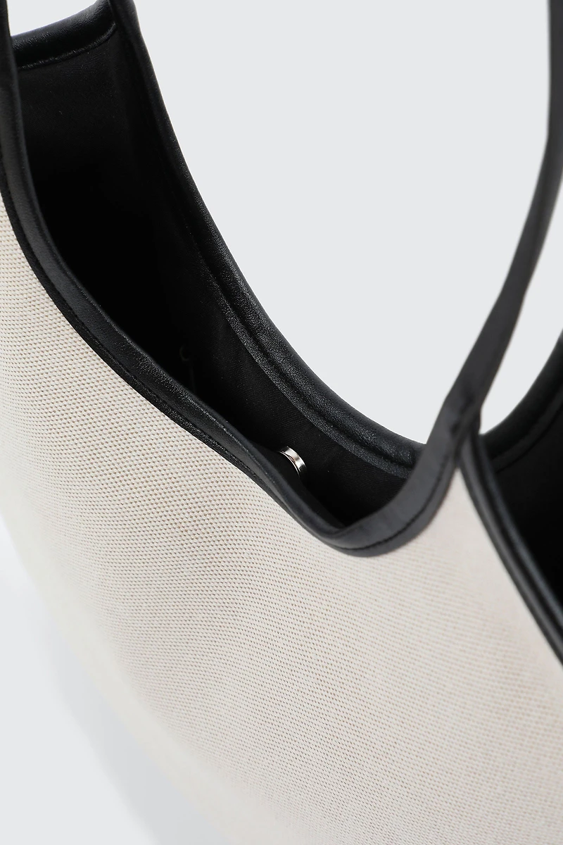 Sac fourre-tout passepoilé