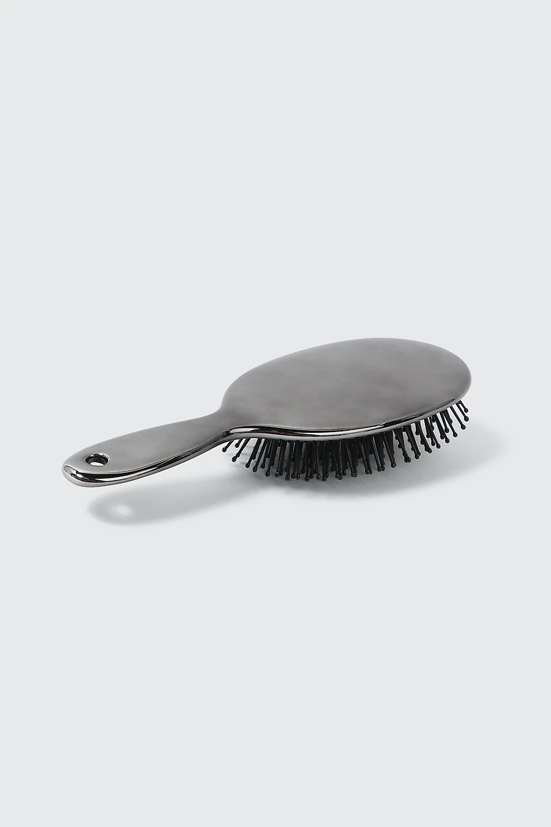 Brosse à cheveux métallique