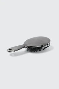 Brosse à cheveux métallique