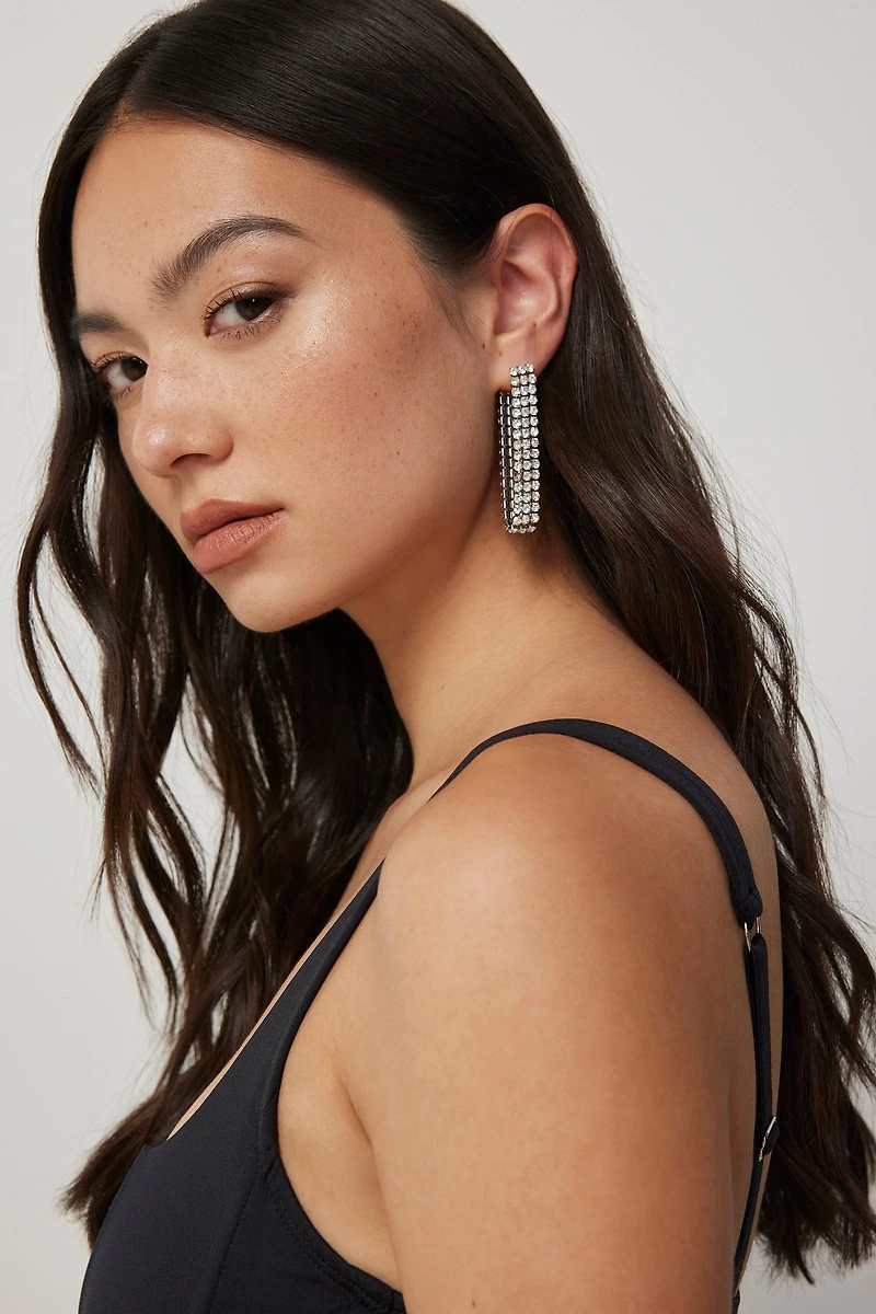 Boucles d'oreilles trois rangs de pierres A.C.W.