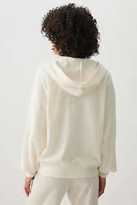 Veste à capuchon et glissière en tricot gaufr