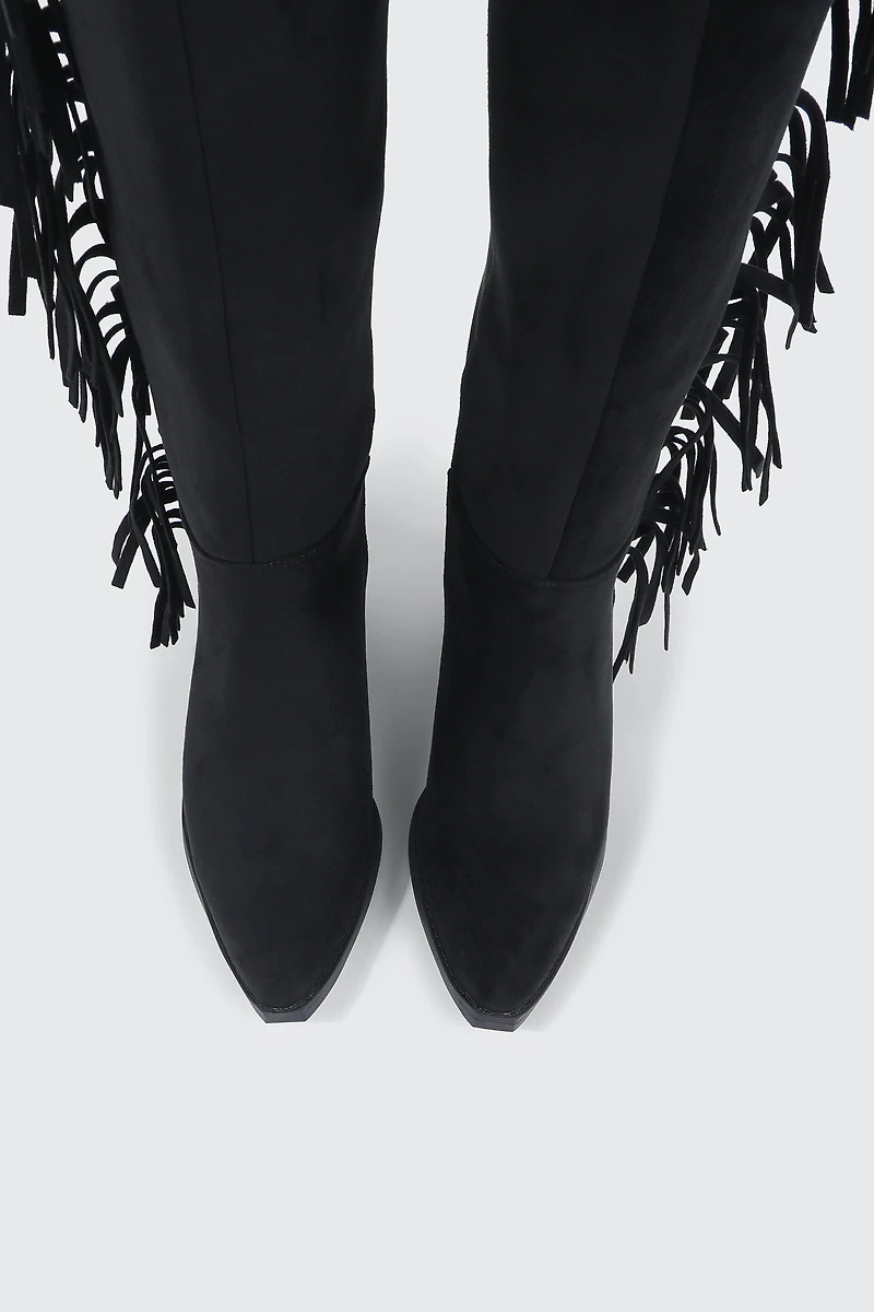 Bottes de cowboy aux genoux