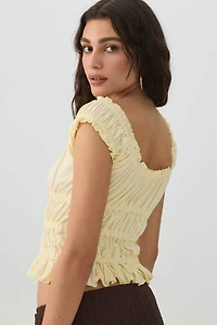 Haut court à volants