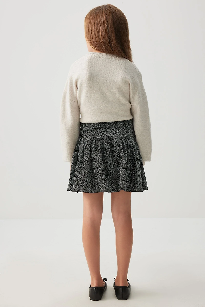 Jupe courte scintillante à taille froncée