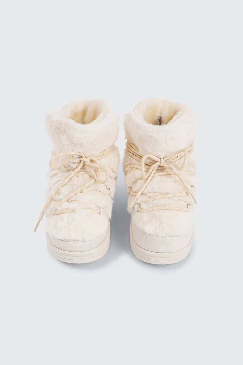 Bottes lacées en faux mouton