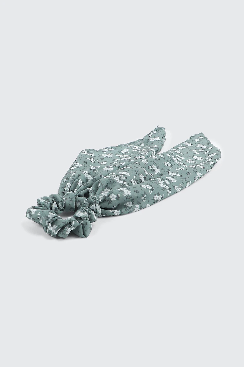Chouchou tissé à pointes et motif floral
