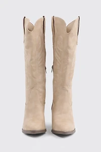 Bottes de cowboy aux genoux