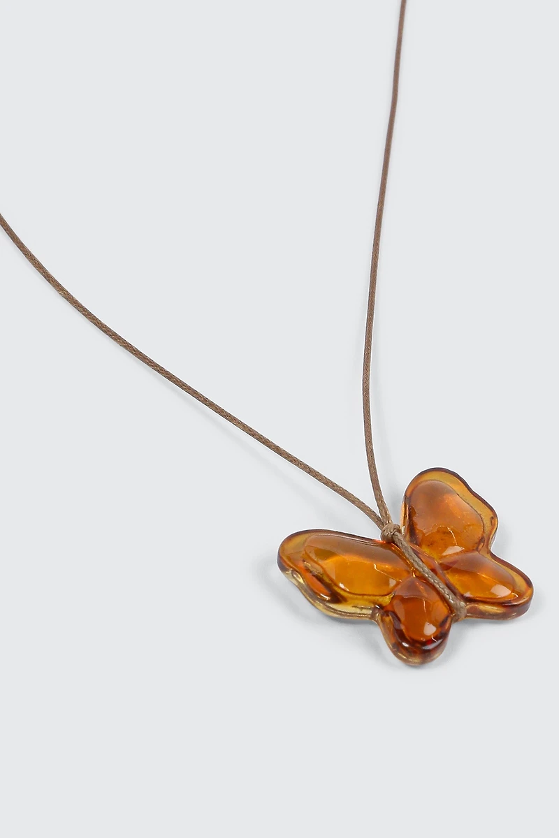 Collier cordon à pendentif papillon