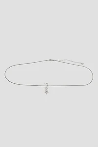 Perçage de nombril à grappe de pierres avec chaîne