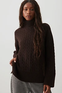 Chandail à col roulé en tricot torsadé