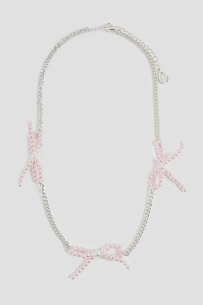 Ardene Pink Pearl Bow Necklace in Silver