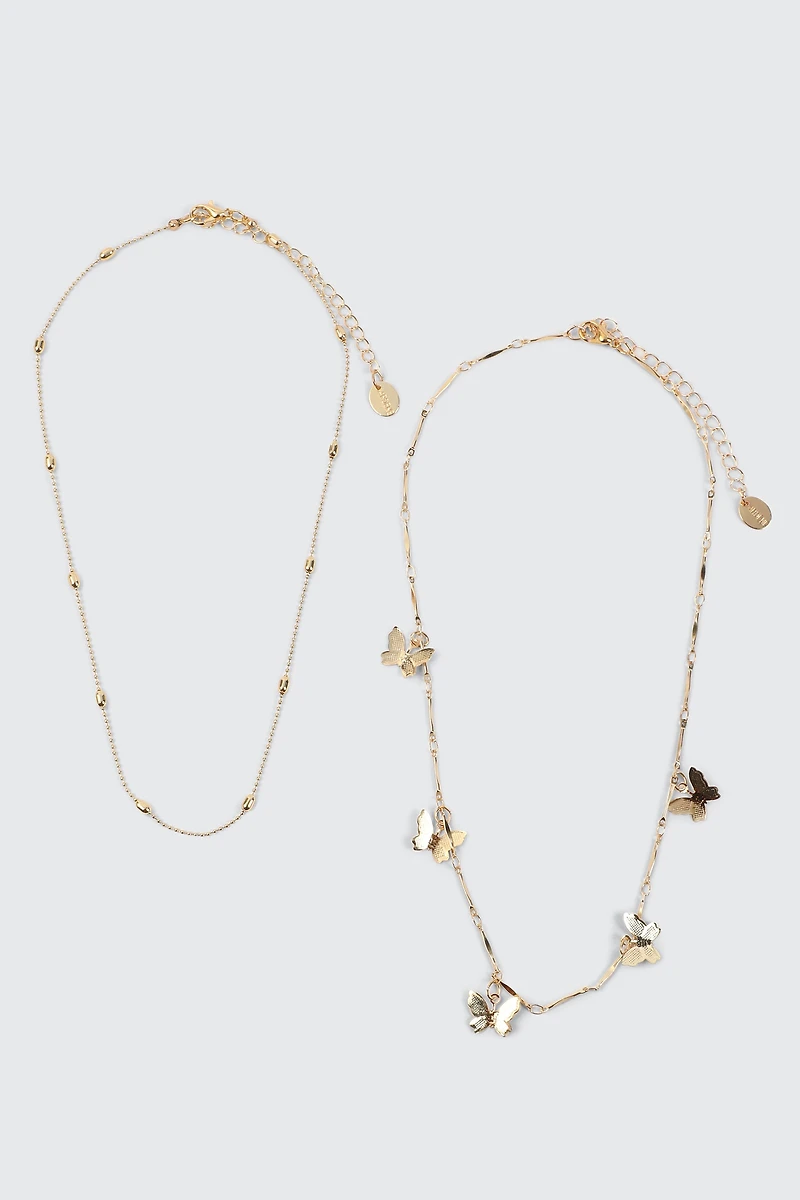 Collier deux rangs à breloques papillons
