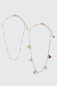 Collier deux rangs à breloques papillons