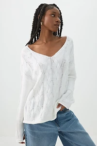 Chandail ample à col V en tricot torsadé