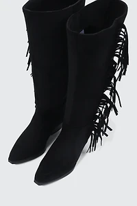 Bottes de cowboy aux genoux