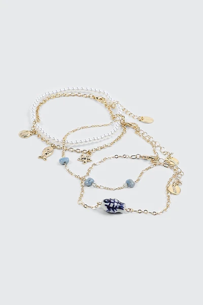 Ardene 4-Pack Ocean Themed Anklets in Gold