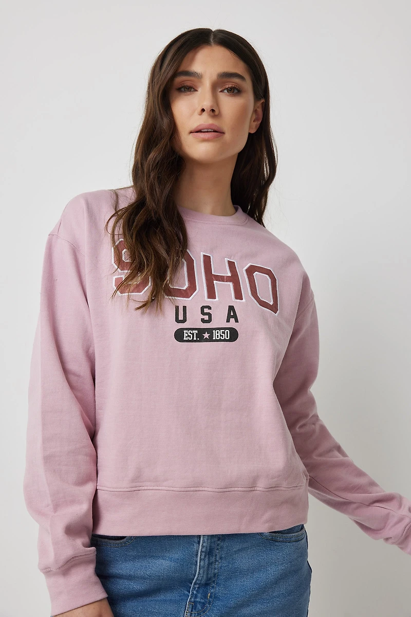 Ardene Satin Destination Patch Sweatshirt in Light Pink | Size Large | Polyester/Cotton | Fleece-Lined