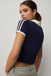 Polo court à détails contrastants