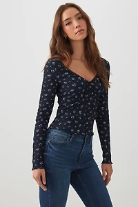 T-shirt à col V et manches longues fleuri