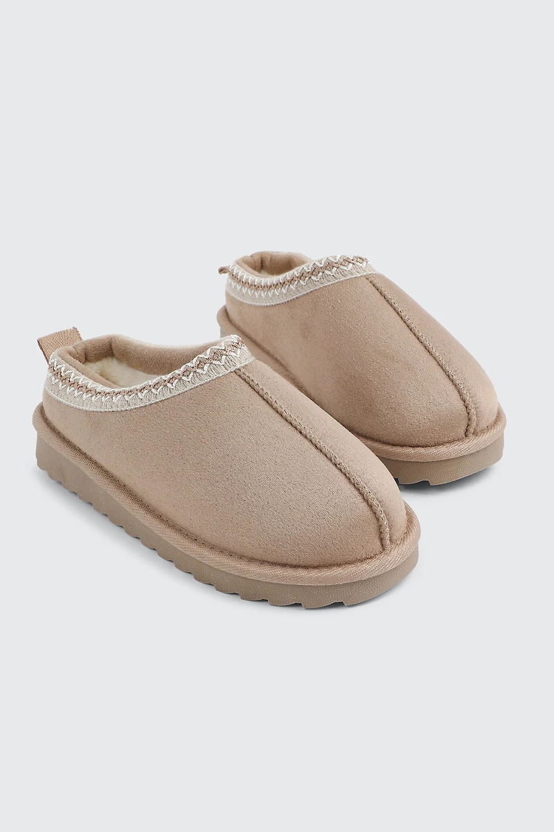 Sabots en faux mouton à bordure accent