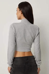 Chandail à col montant froncé glissière