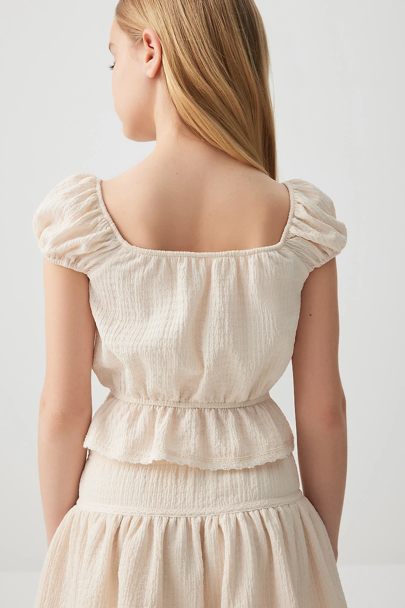 Haut à basque et manches bouffantes