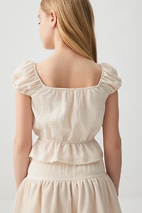 Haut à basque et manches bouffantes