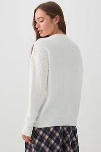 Chandail long à col en tricot torsad