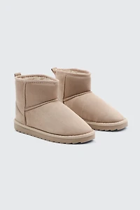 Bottes mini en faux mouton