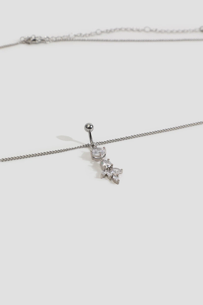 Perçage de nombril à grappe de pierres avec chaîne