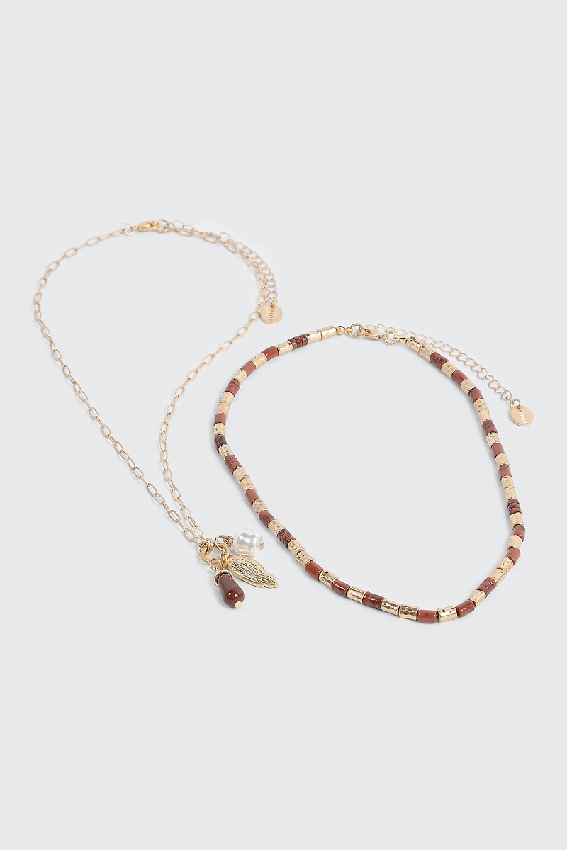 Ensemble de 2 colliers perles et breloques