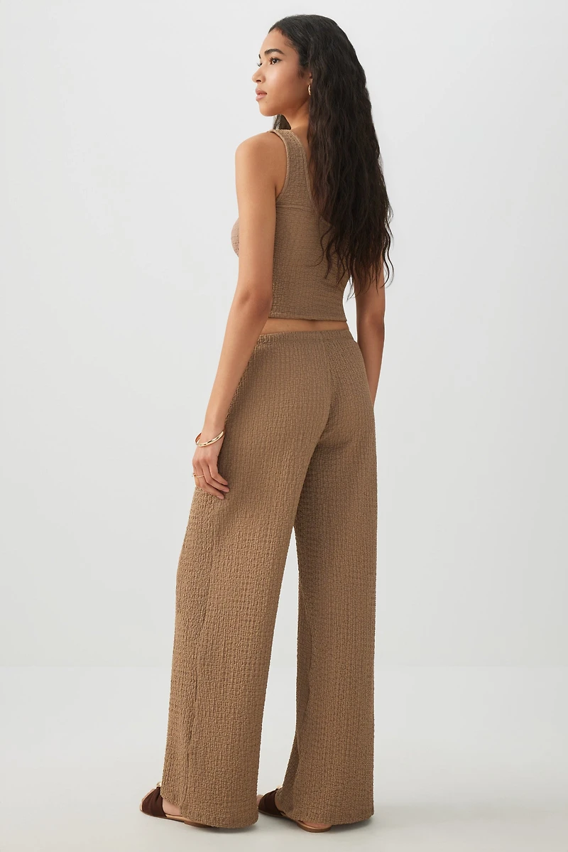 Pantalon fluide en tissu texturé