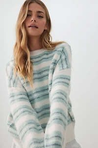 Chandail en tricot pelucheu rayé