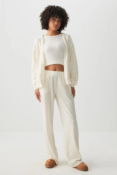 Veste à capuchon et glissière en tricot gaufr