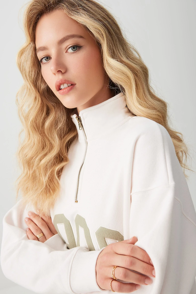 Chandail ample à demi-glissière broderie