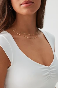 T-shirt à col V et mancherons doux comme du beurre