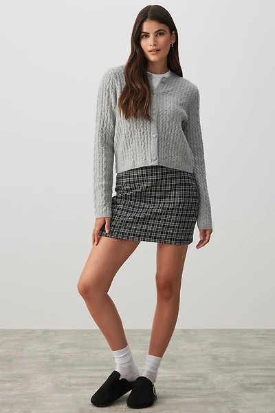 Cardigan court en tricot torsadé