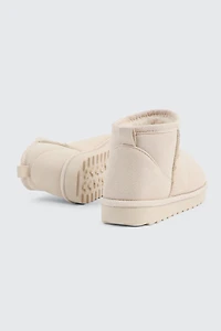 Bottes mini en faux mouton