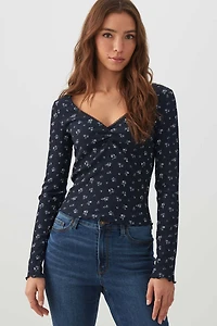 T-shirt à col V et manches longues fleuri