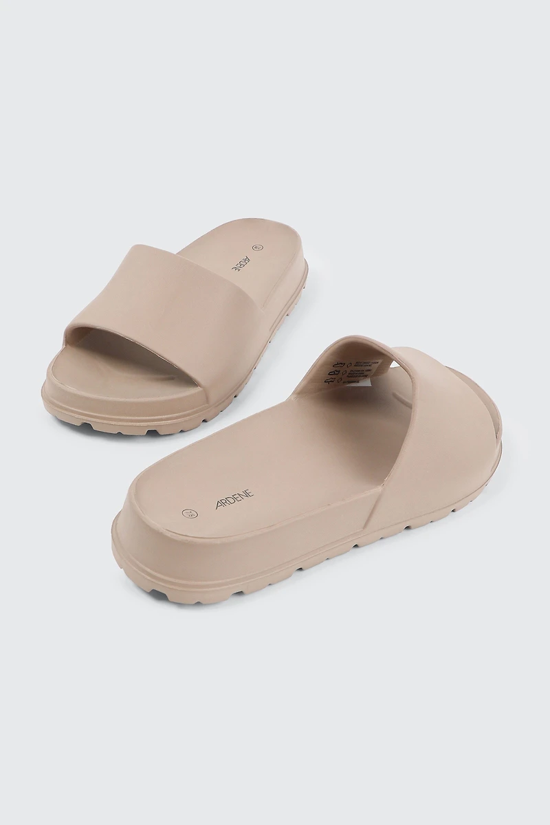 Glissières à semelle volumineuse