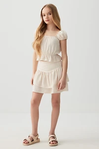 Haut à basque et manches bouffantes