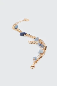 Bracelet trois rangs à pendentif poisson