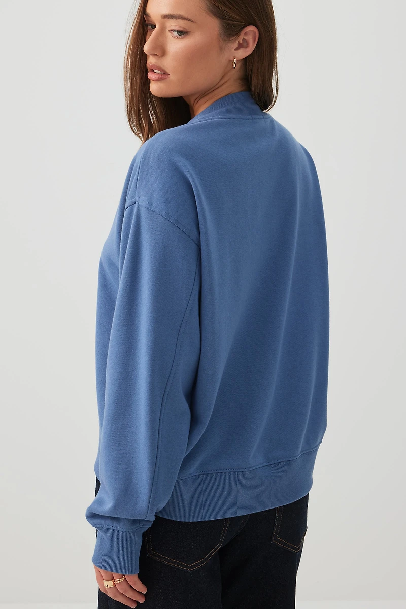 Chandail à col V en jersey bouclette