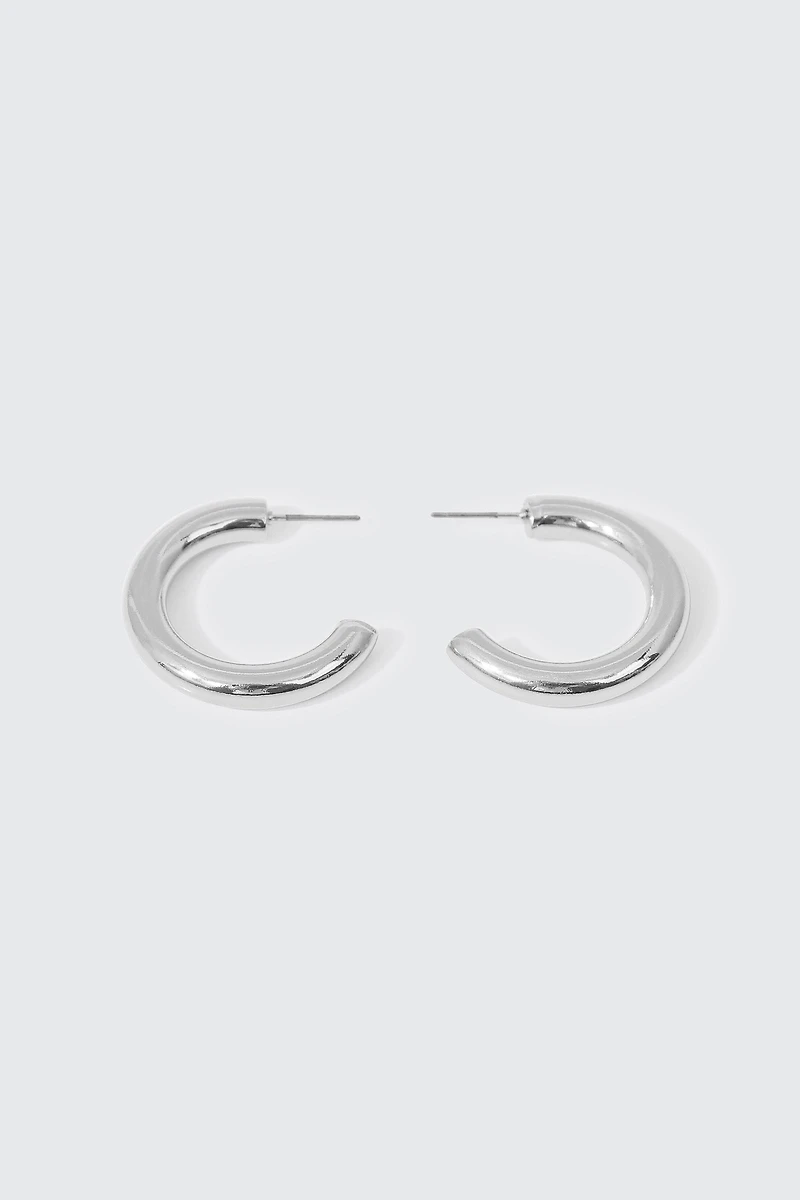 Ardene Thick Tubular Hoop Earrings in Silver | Stainless Steel