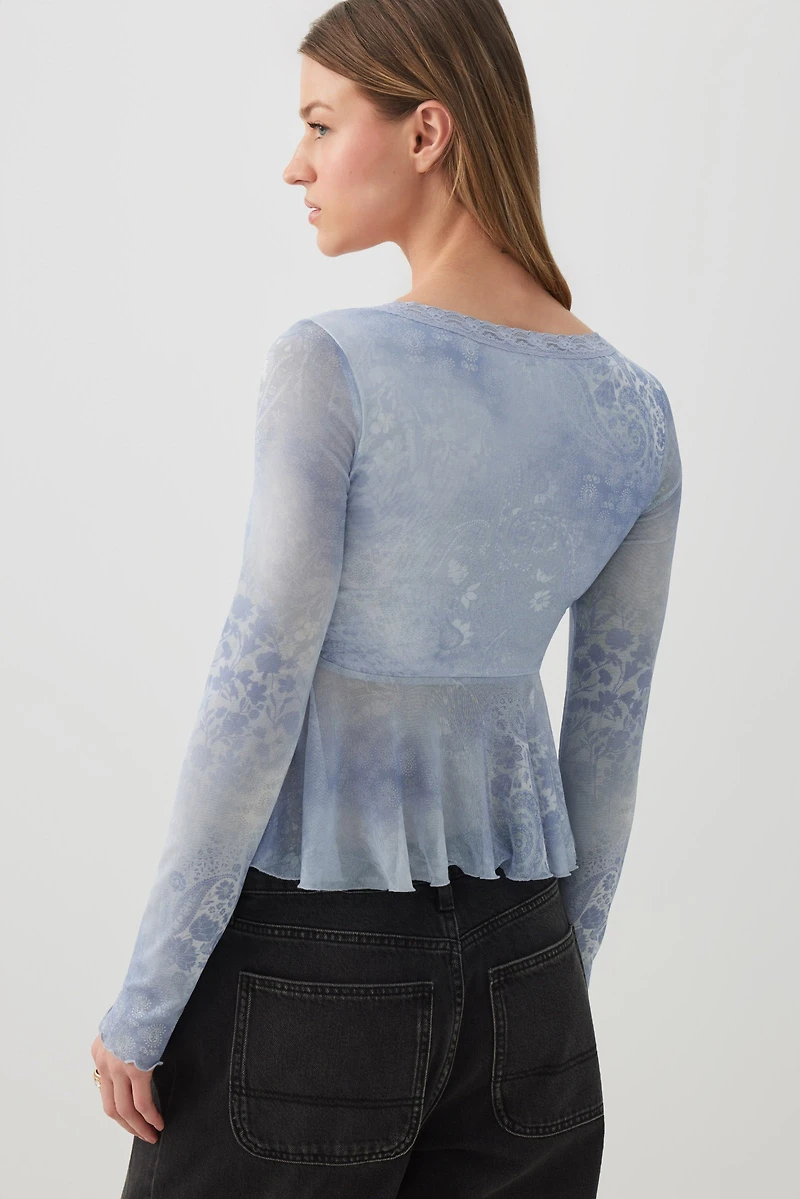 Blouse col V en maille filet imprimée