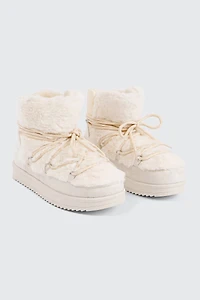 Bottes lacées en faux mouton